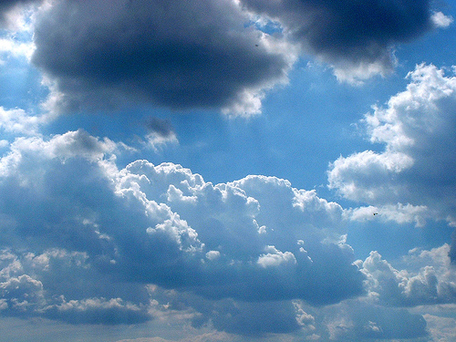 Blue sky with white fluffy clouds (http://www.flickr.com/photos/dominicspics/1148560903/)